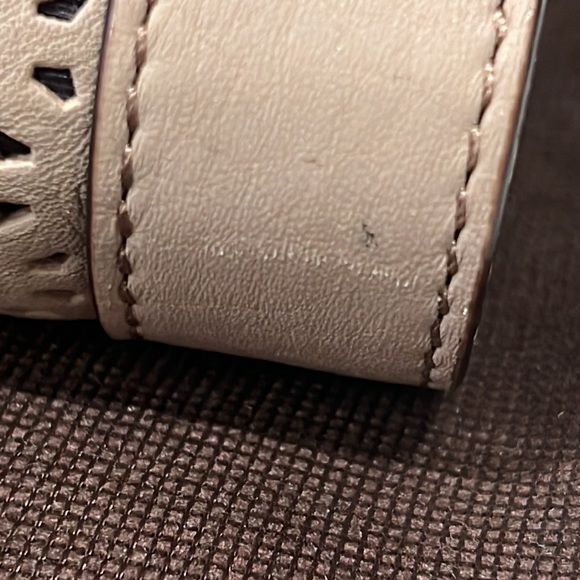 Kate Spade clutch in a taupe leather with laser cutout design. - Picture 5 of 5